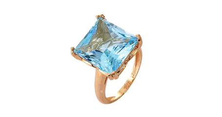 кц150 Золотое кольцо с голубого цвета вставкой.